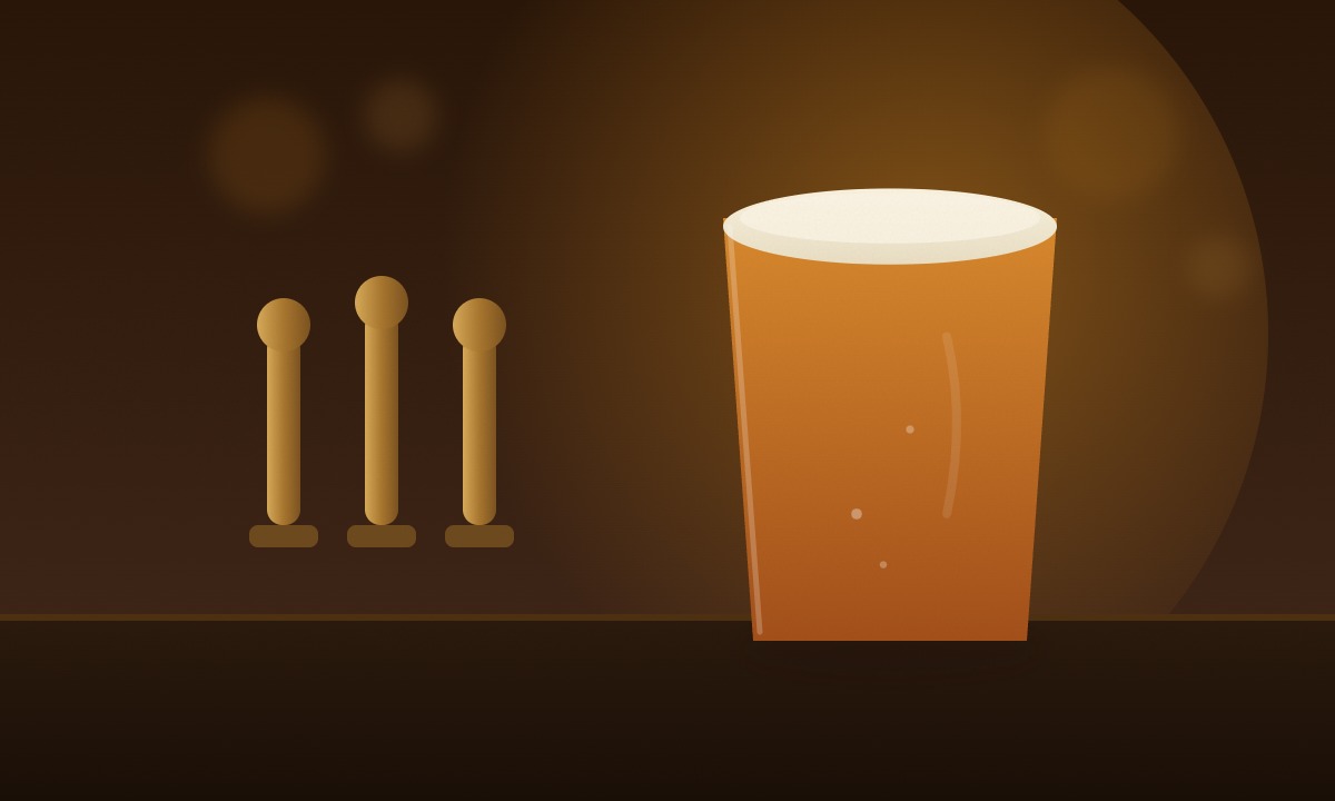 A full pour of amber ale on the taproom bar beside the taps